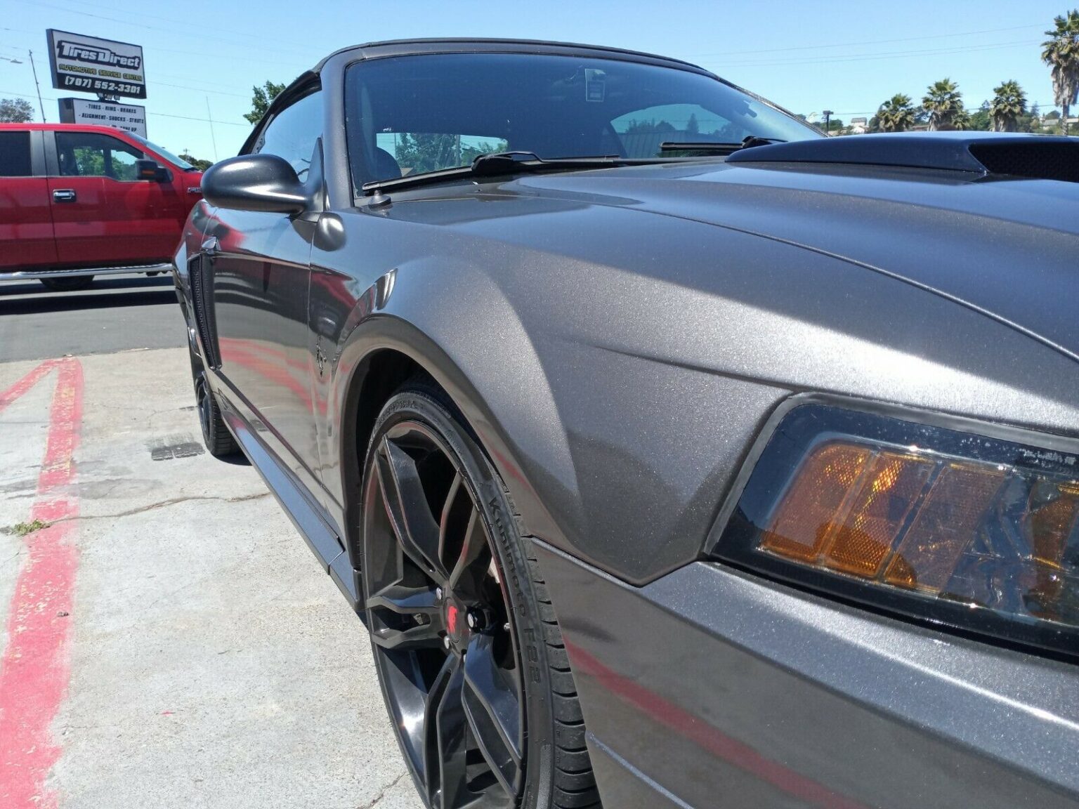 A Dark Charcoal Mustang