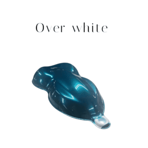 Teal metallic paint sample over white